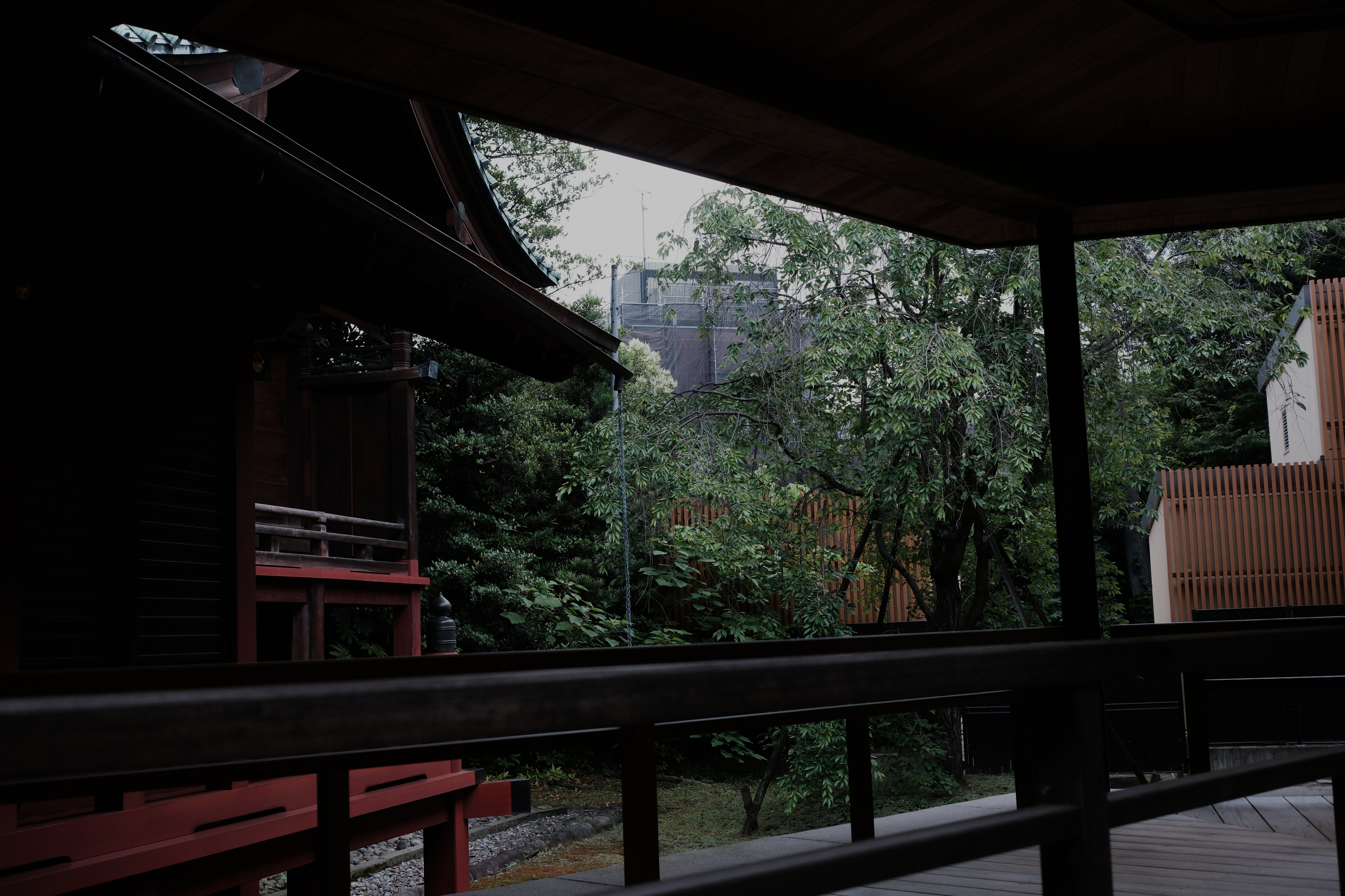 Dark temple corridor at Hodo-ji with red railing